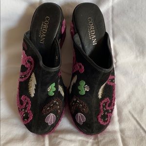 Embroidered clogs